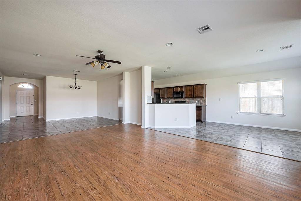 View from the master bedroom of the living area and kitchen.