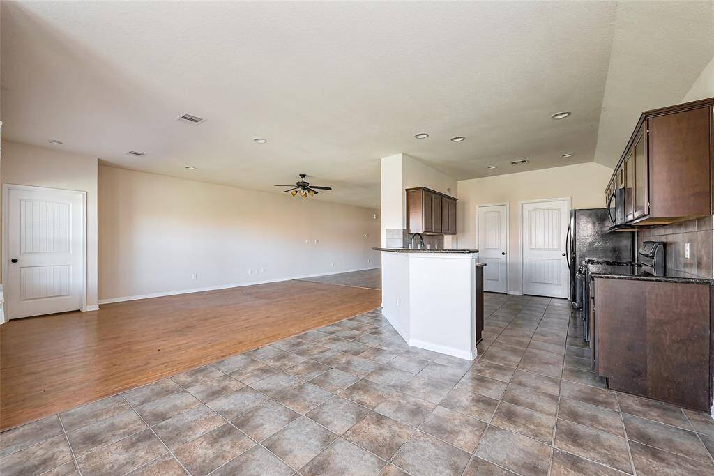View from tbe breakfast area of kitchen and living area.