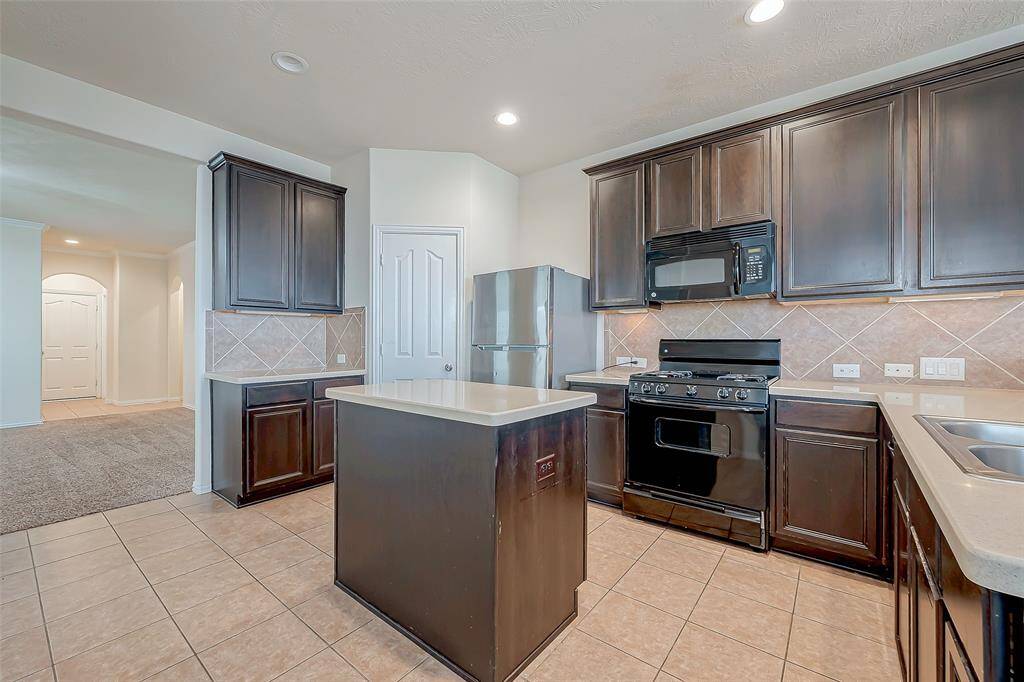 Big cabinets with appliances.