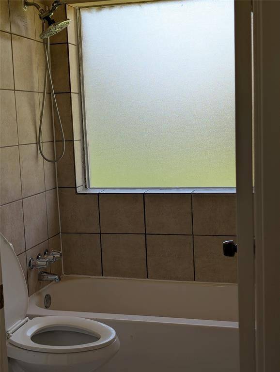 Primary bath with tub/shower combination.