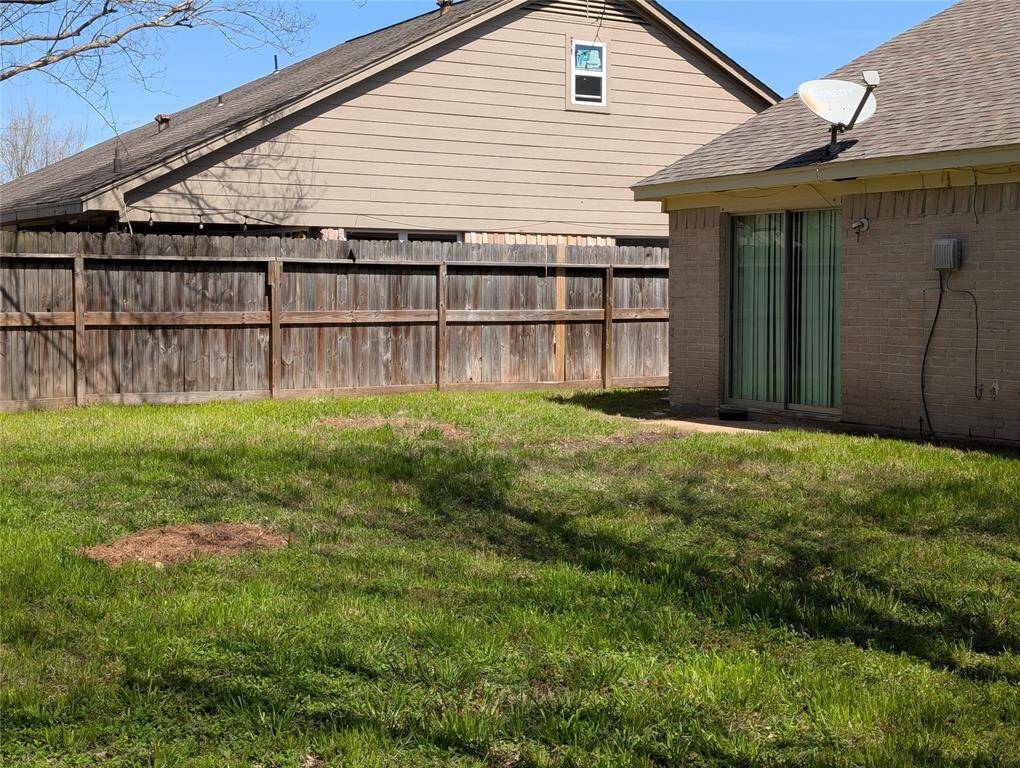 Just had a tree removed from back yard, giving it more light and a larger space to enjoy for a family or pets.