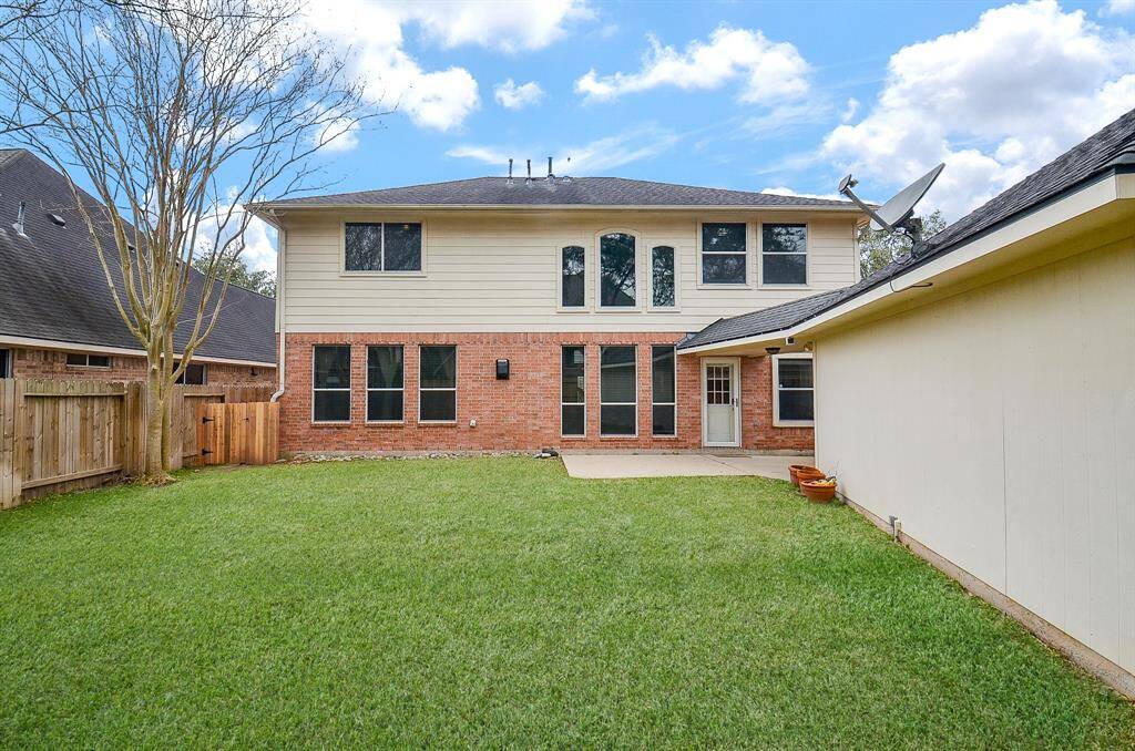 This Two Story home boasts walls of windows to allow for natural light inside!
