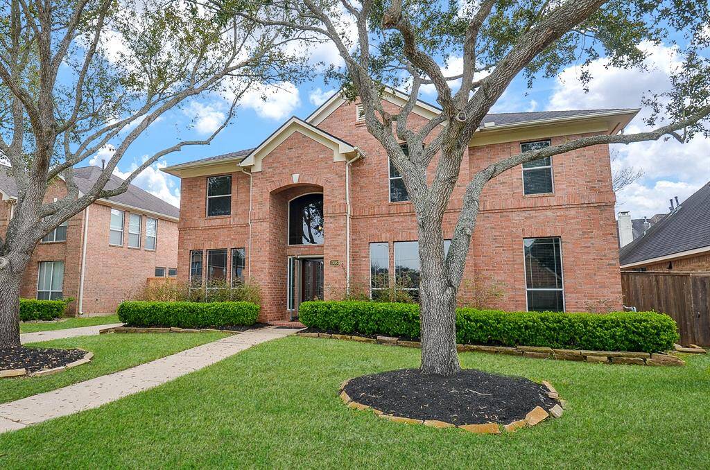 This gorgeous 2story brick home is ready for you!