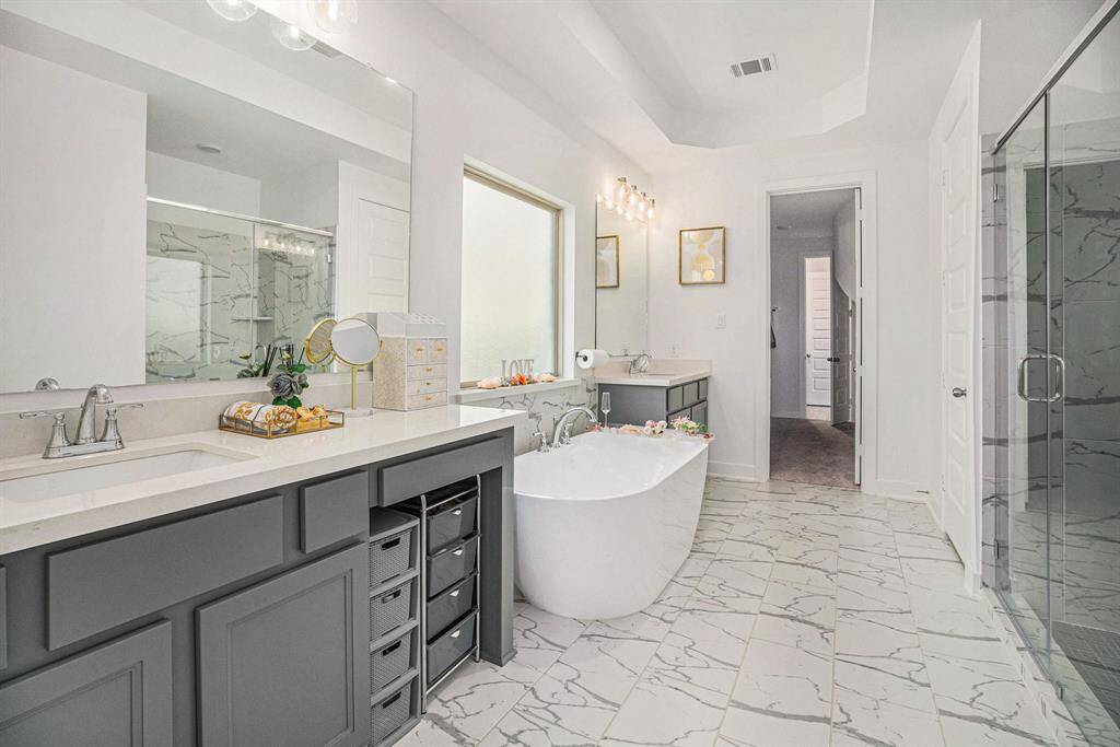 Double vanities with plenty of counter space.
