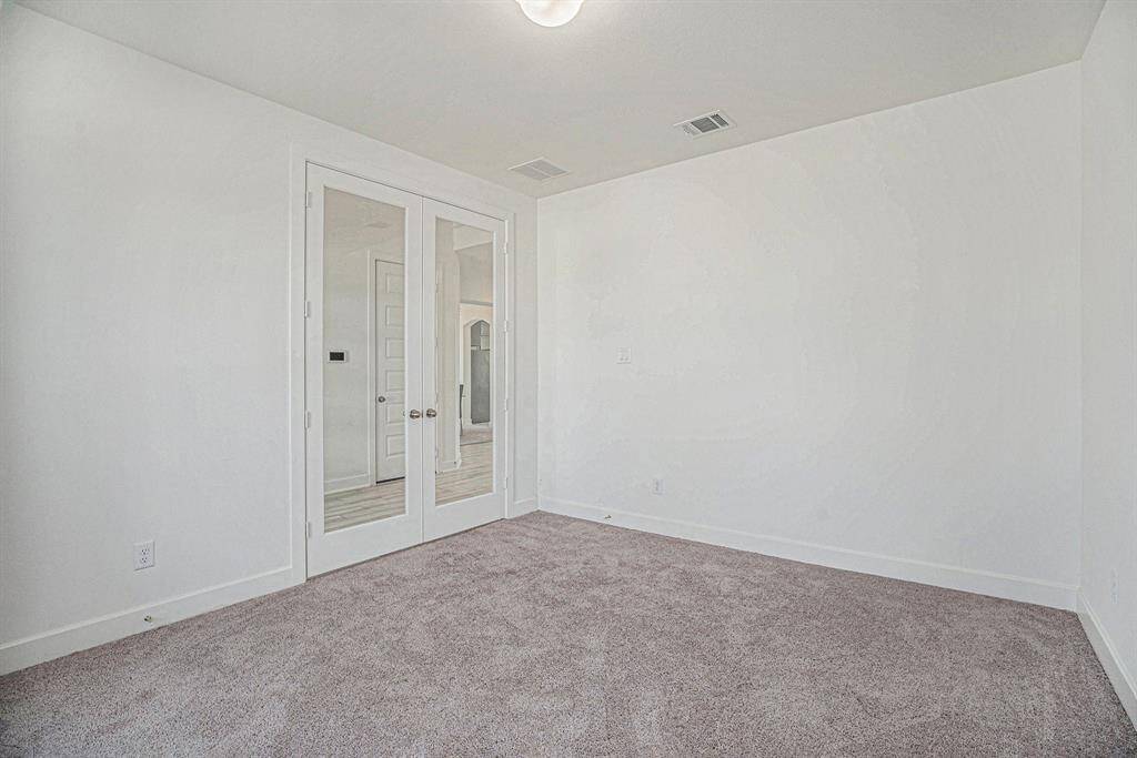 Study has double glass doors for privacy.