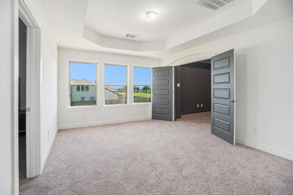 Spacious upstairs game room perfect for a pool table.