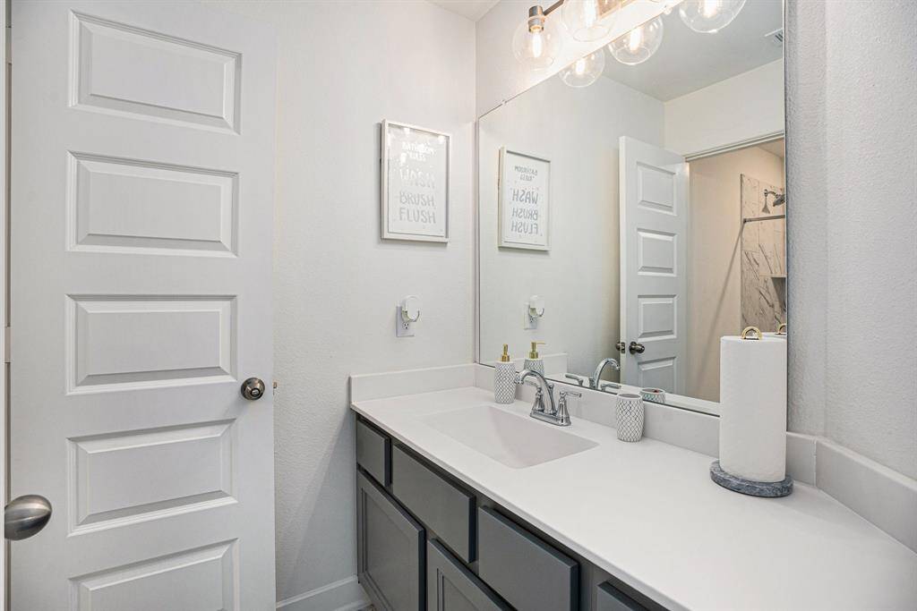Second upstairs bathroom located just off the game room.