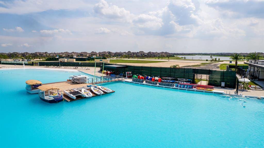 The 12-acre lagoon offers sailing, kayaking, and paddleboarding at the National Sailing Club.