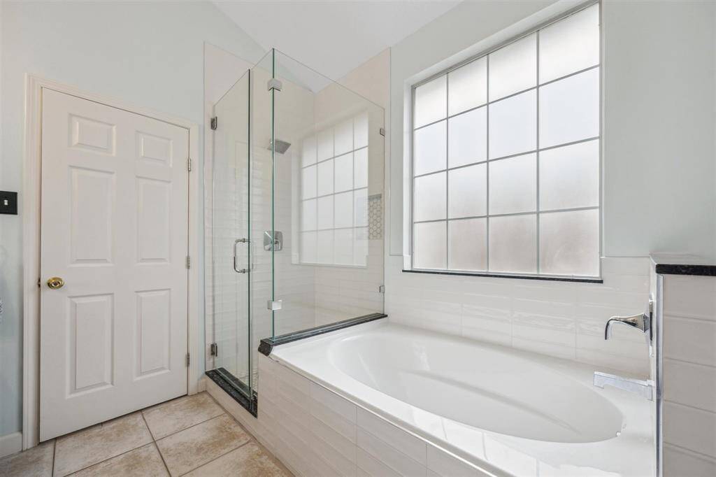 Standing shower and soaking tub