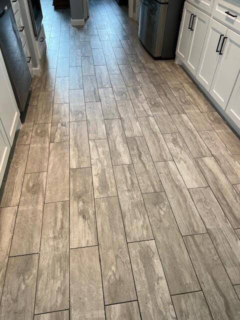 Remodeled ceramic tile flooring throughout 1st floor 2022