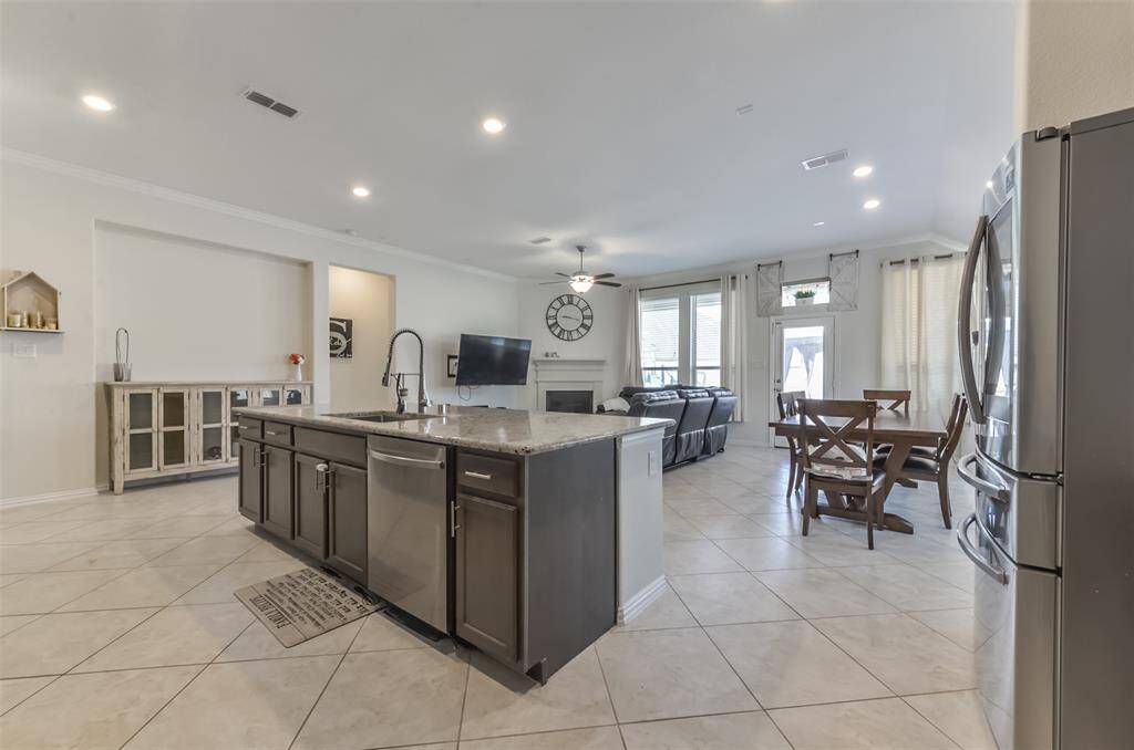 Kitchen is open to the family room and breakfast area.