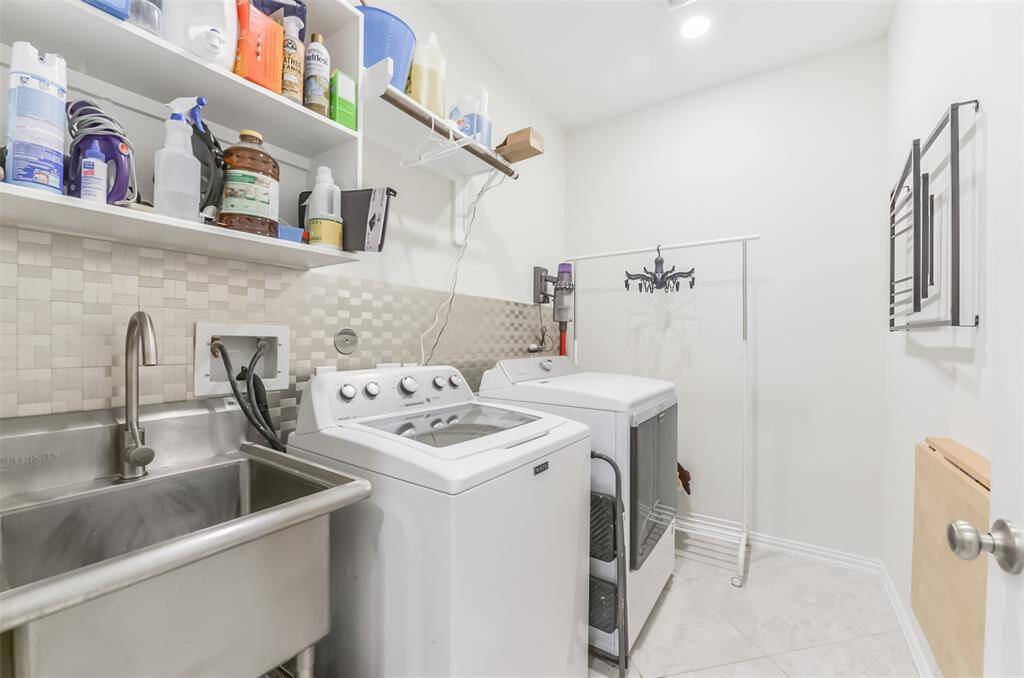 Sink no longer in the utility room. Has been removed.
