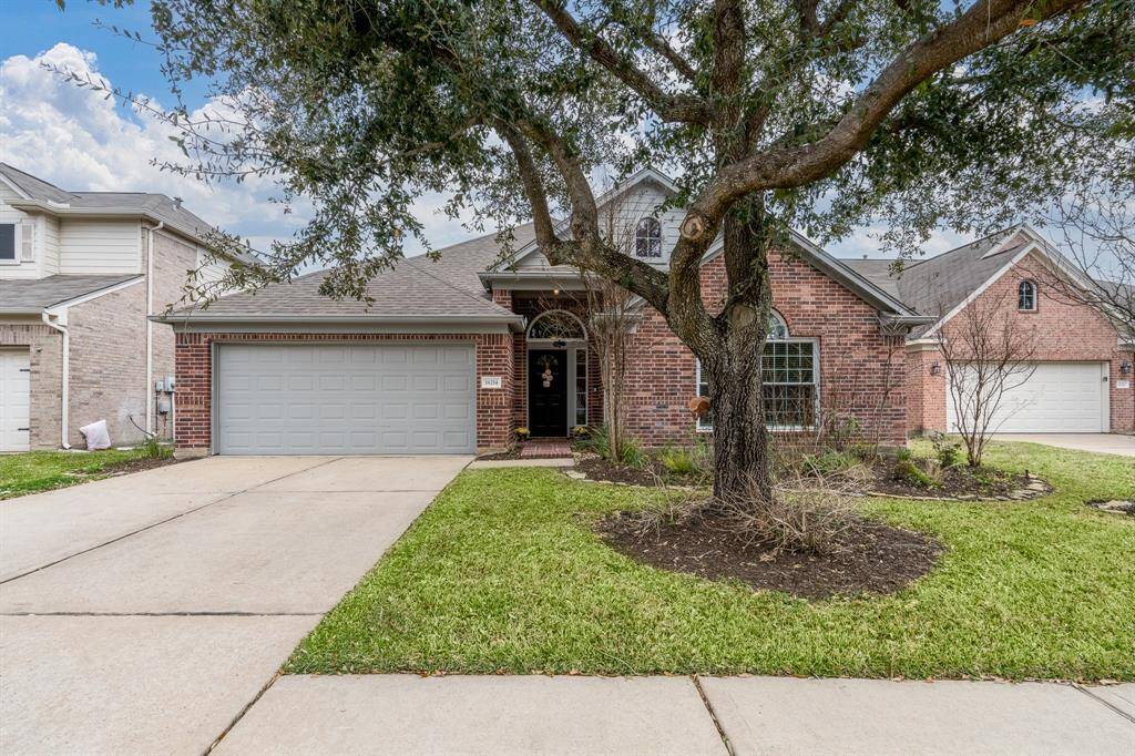 Welcome home to 18214 Olive Tree Court located on a quiet cul-de-sac in the heart of Cypress.