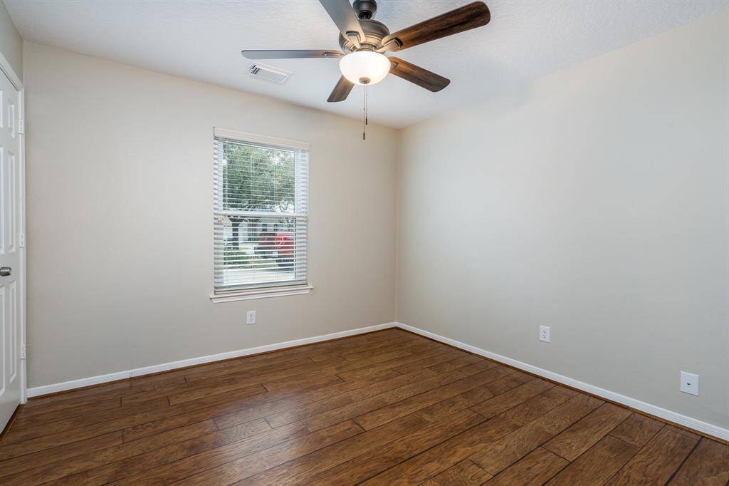 This bedroom is perfect for a nursery or home office.
