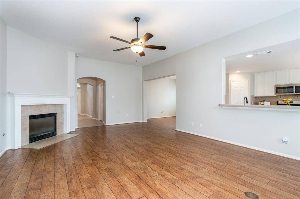 Breakfast bar overlooking the family room is great for busy mornings.
