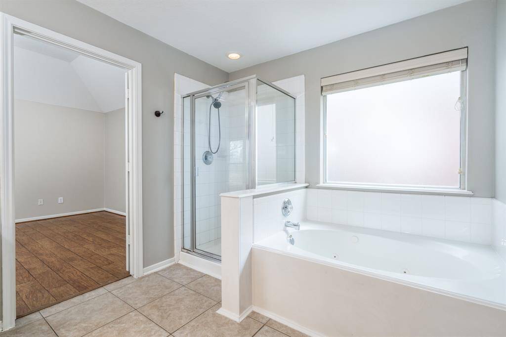 Separate shower and jetted tub!
