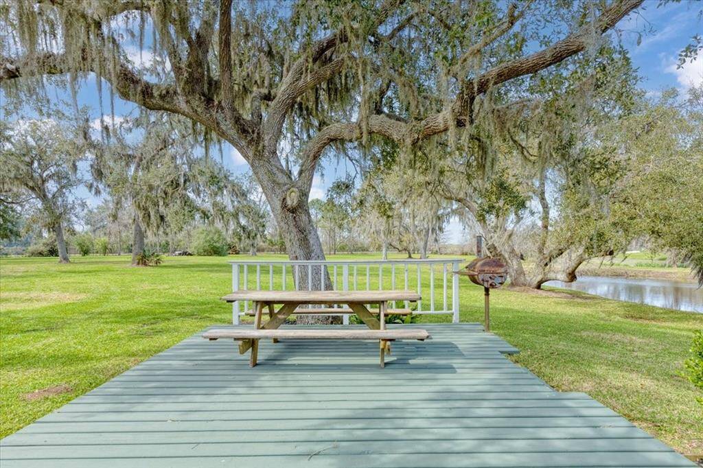 Table/Seating area on property, by the pool.