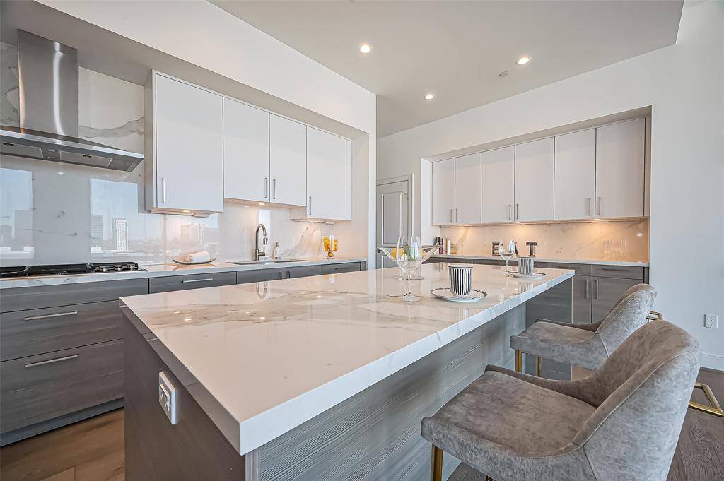 WOLF appliances, porcelain sealed countertops, lots of cabinet space and walk in Pantry!