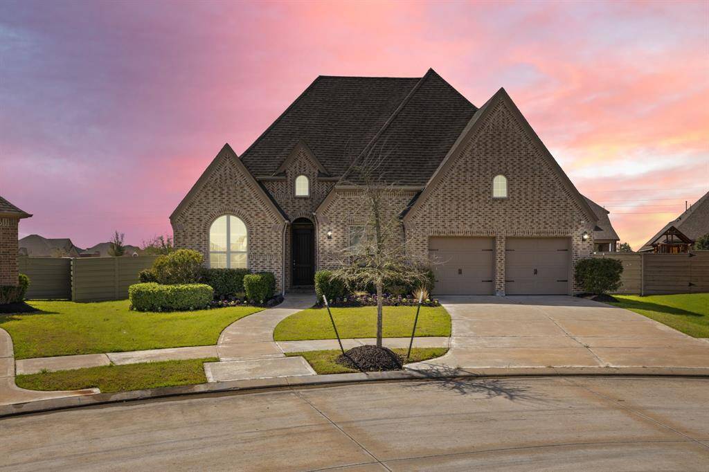 Twilight view of the beautiful front elevation!