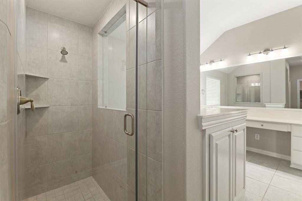 There is a walk-in shower in the primary bathroom!