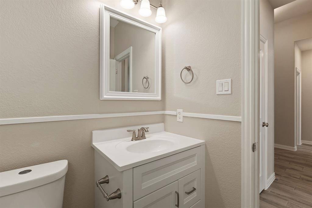 In addition to the 3 full bathrooms, the home includes a half bathroom!