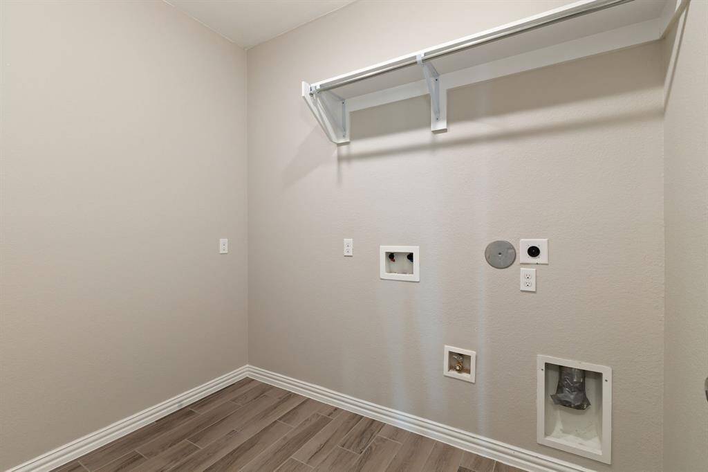 The utility room offers extra space!