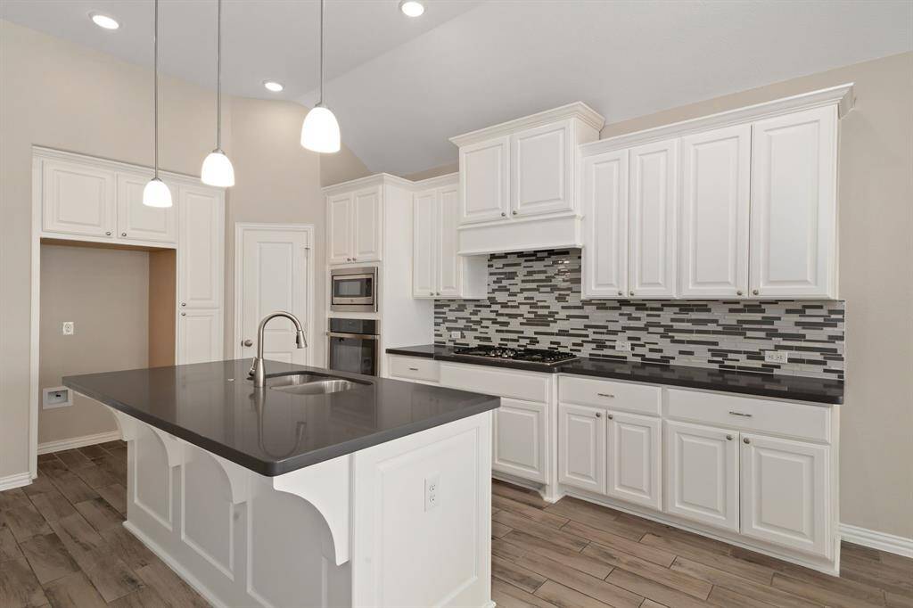 Another view of the ISLAND KITCHEN AND STAINLESS STEEL APPLIANCES!