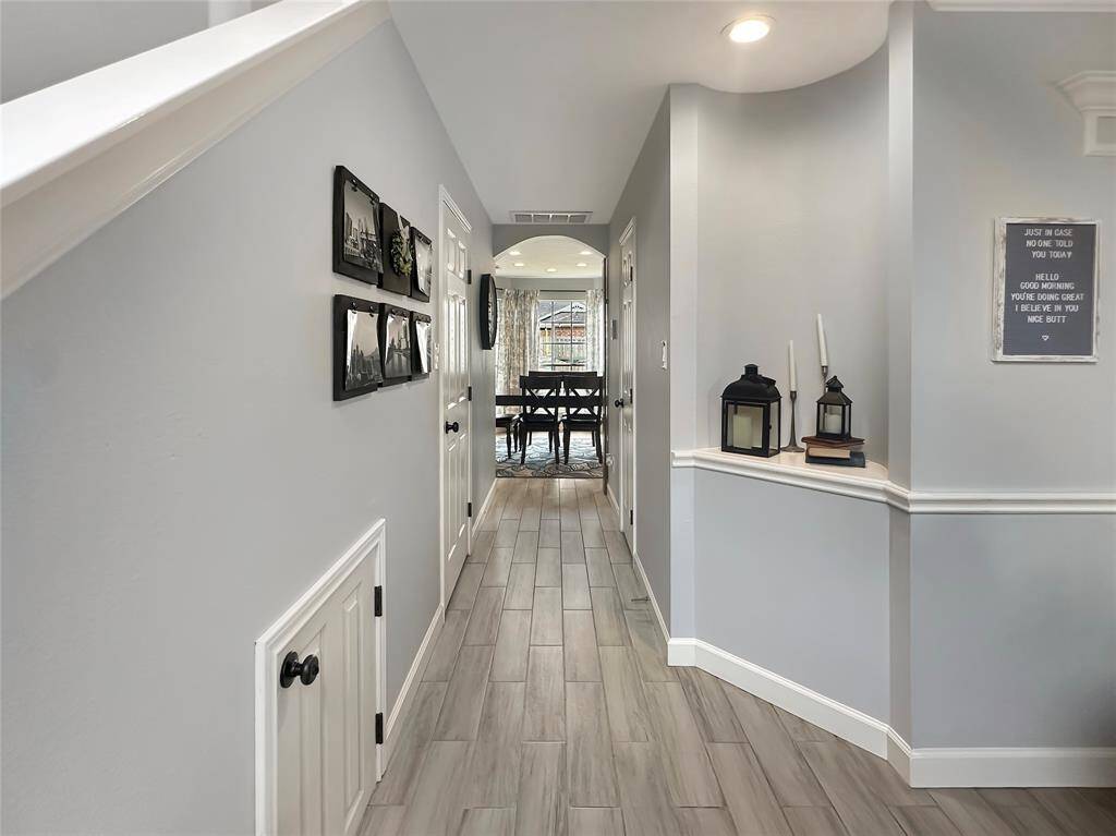 Convenient doggie space tucked under the stairs, providing a cozy spot for your furry friend to relax.