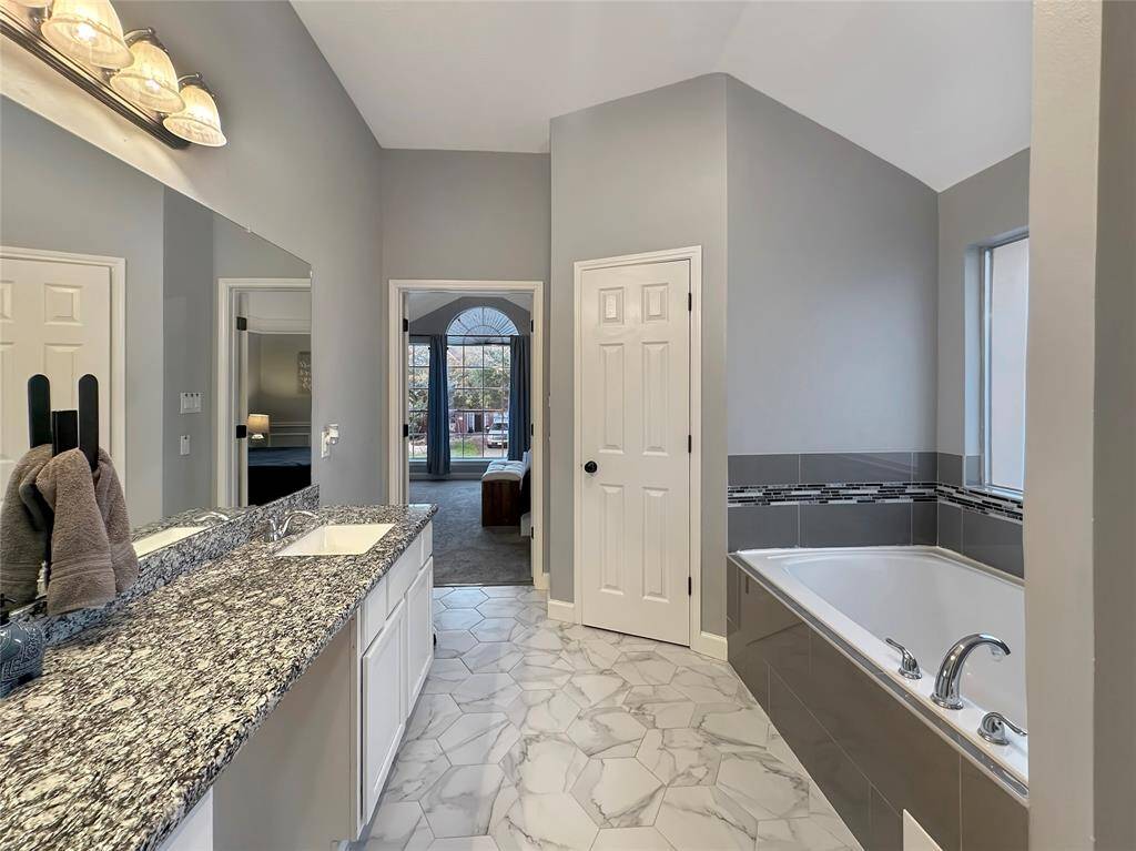 Elegant bathroom with modern fixtures and a serene, spa-like atmosphere.
