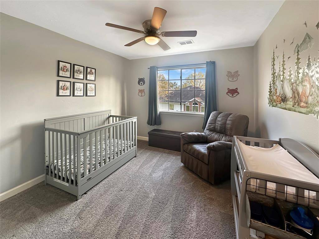 Cozy secondary bedroom with ample closet space and plenty of natural light.