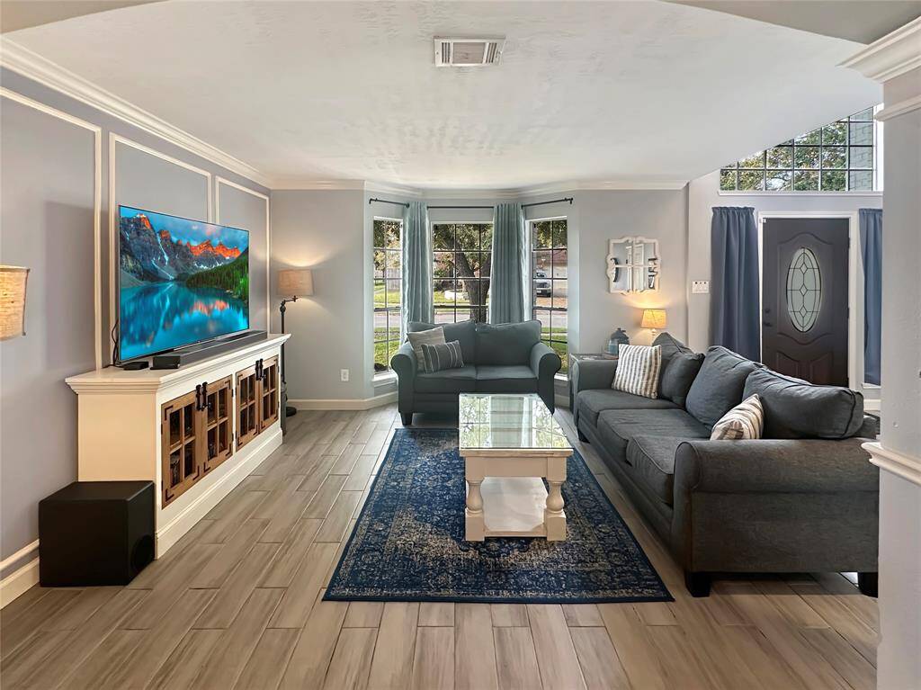 Spacious living room with plenty of light!