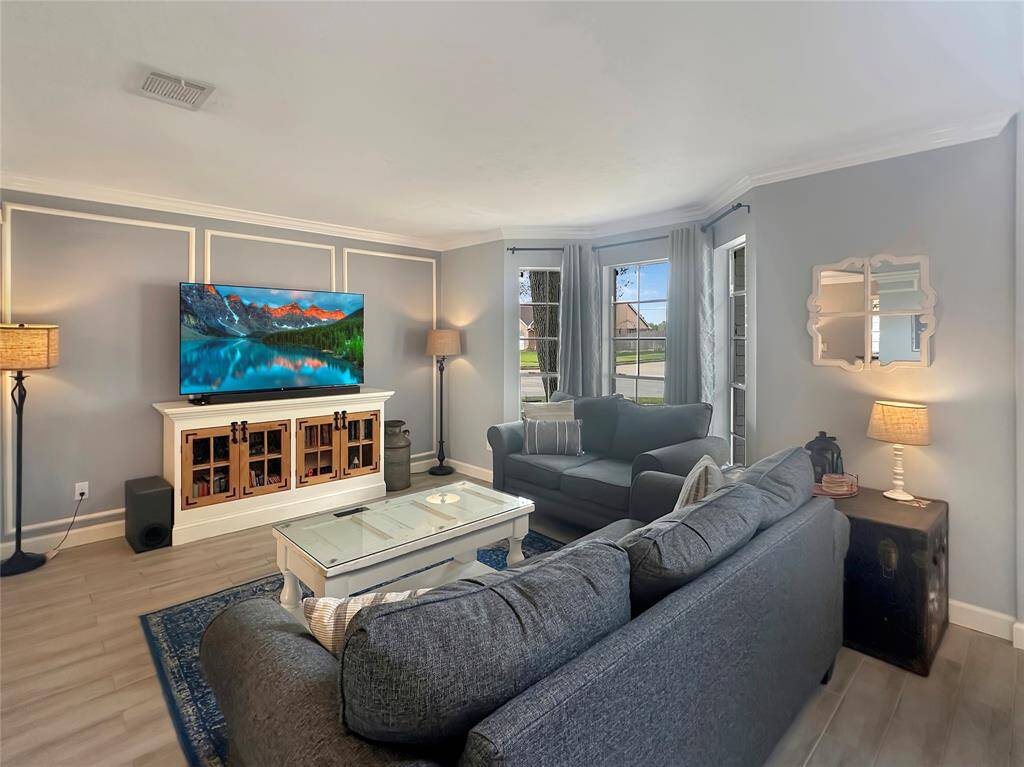 Living room flows into the dining/office space