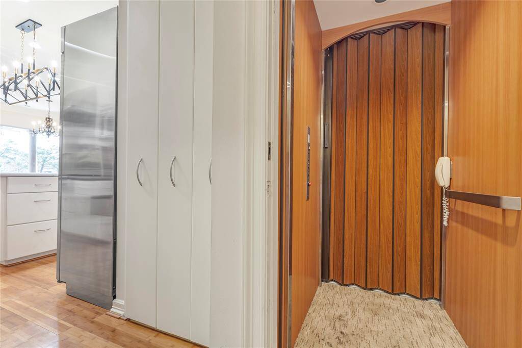 Elevator off of kitchen which goes to all 3 floors.