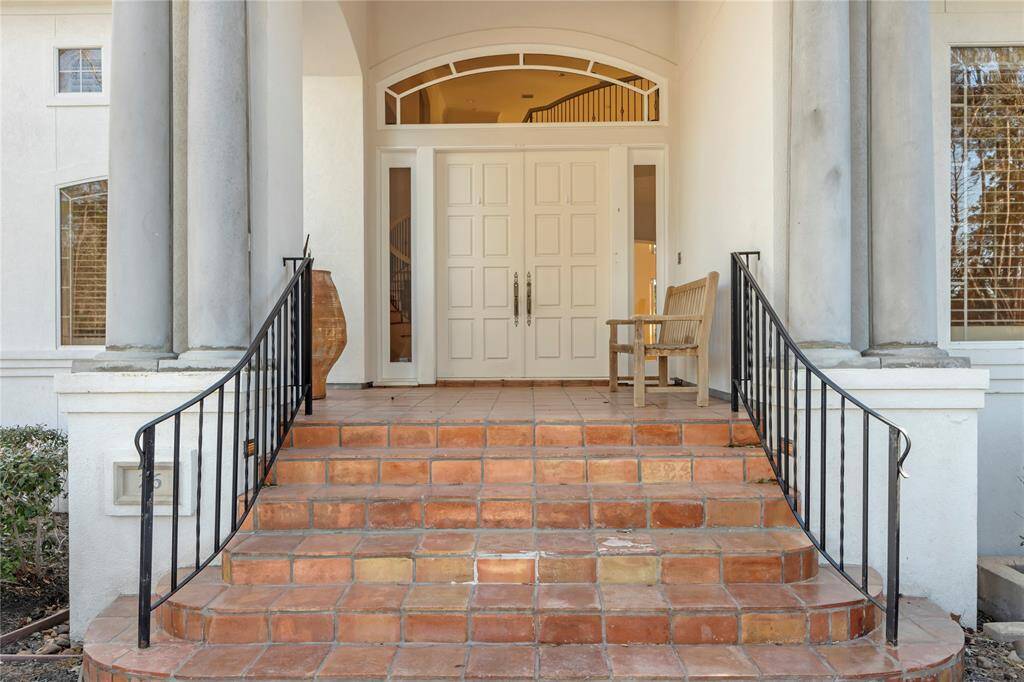 Stately entryway to 26 W Shore Dr.
