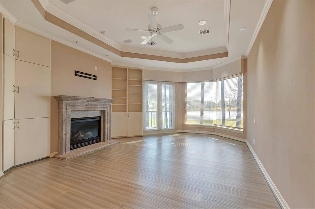 Primary bedroom with 2023 floors.