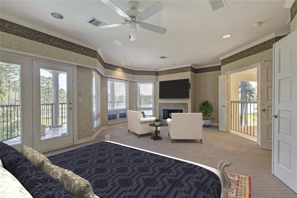 Second primary suite with gas fireplace and its own private balcony for enjoying those times you want space. Juliet balcony with views of the living area.