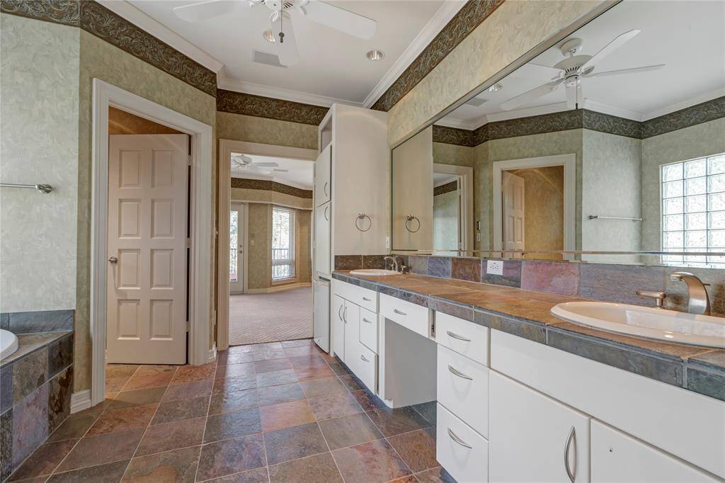 2nd primary bathroom double sinks and vanity area.