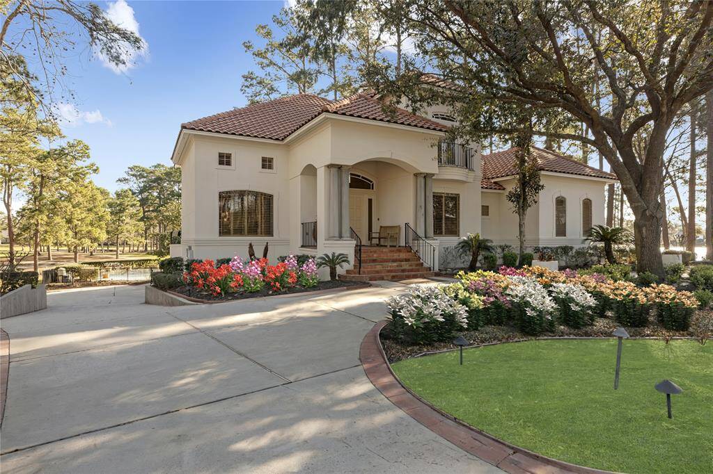 Circle driveway.  Flowers where virtually staged.