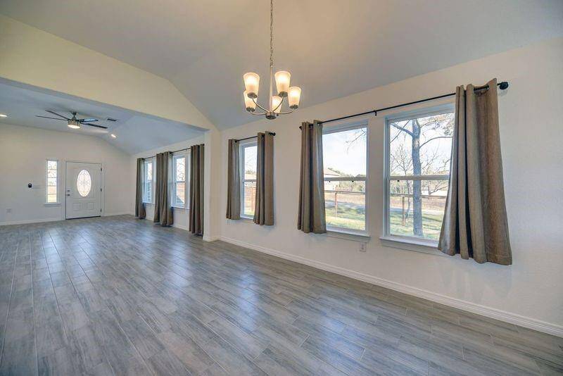 Looking from the kitchen to the front door- so much natural light!