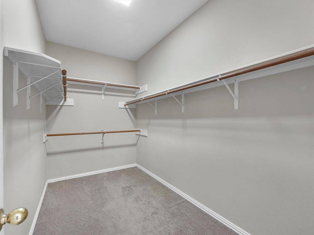 Walk-in closet in the primary
