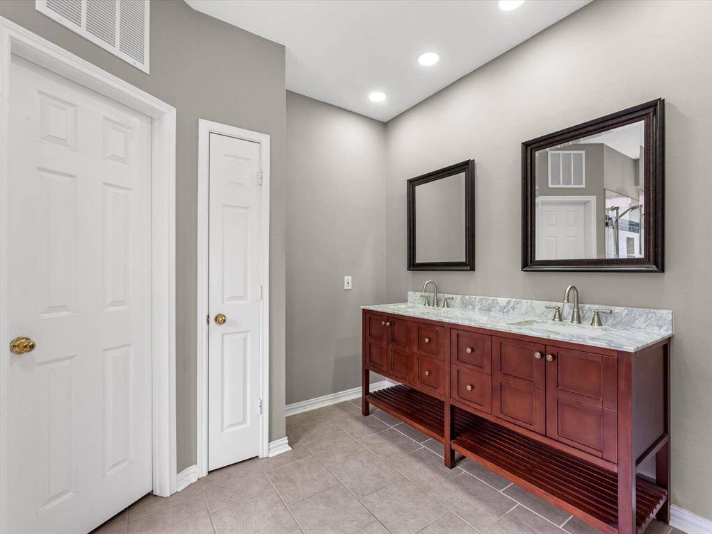 Updated primary bath w/ an over-sized walk-in shower!