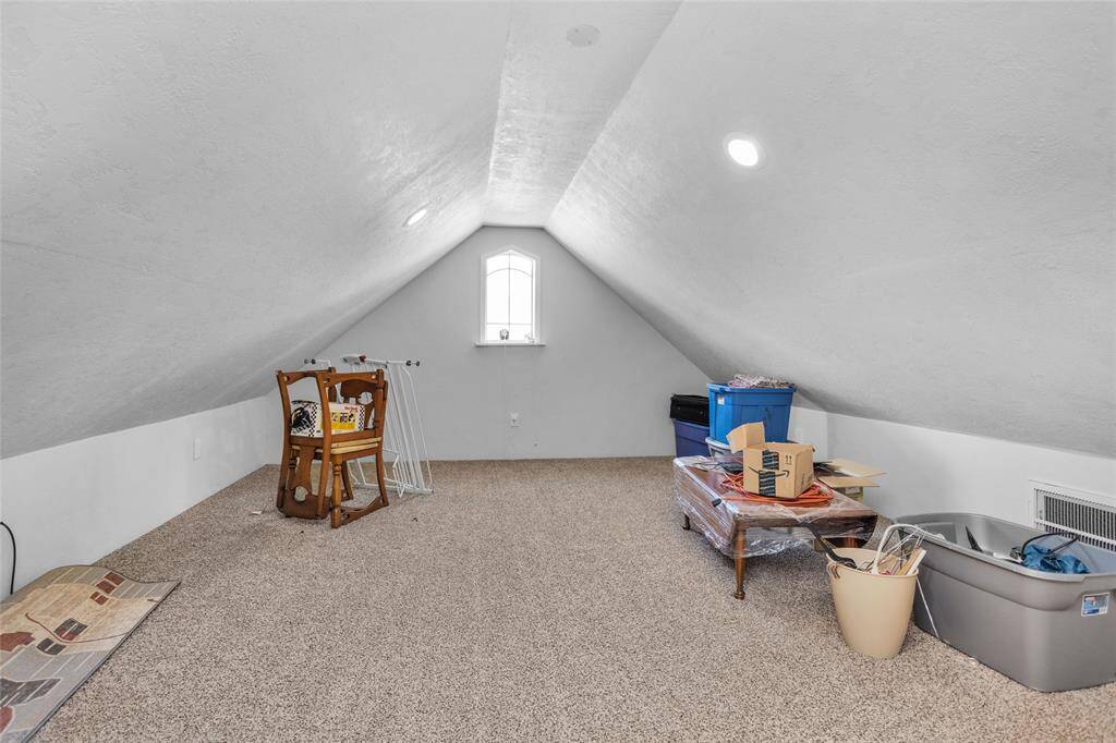 The Texas basement above the garage makes for great storage, media room, gameroom, or even a craft room. Blank space ready for your imagination to design it!
