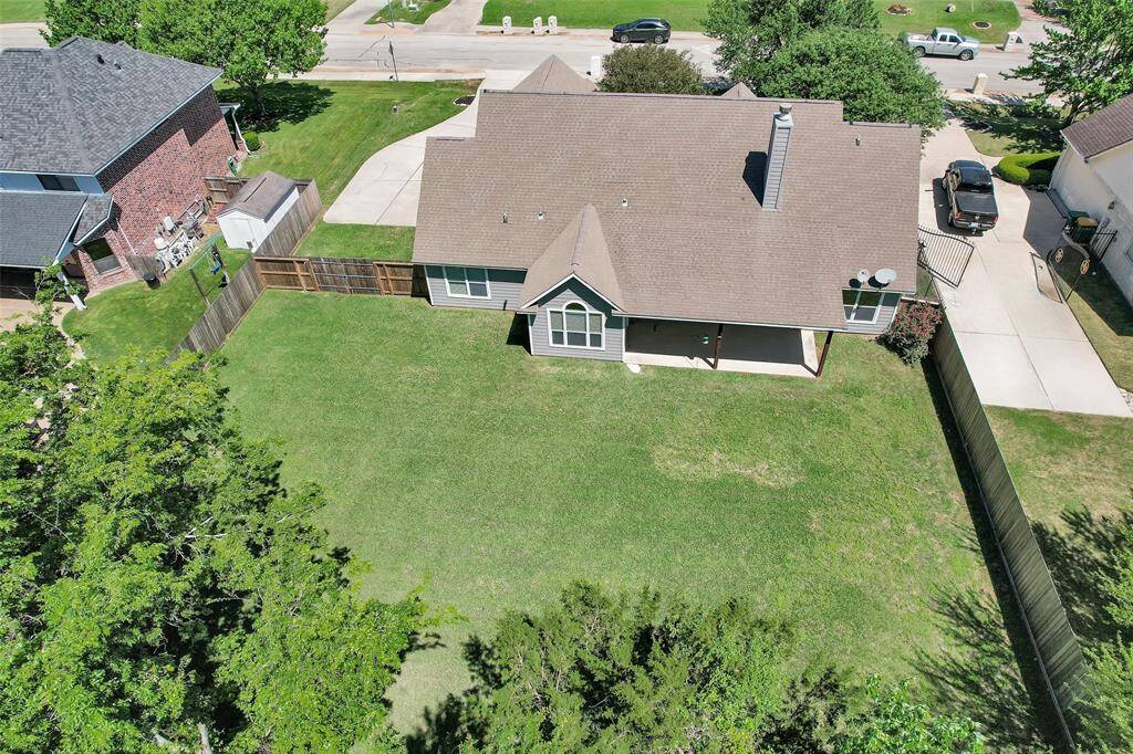 Large backyard with room for pool and small building. Complete NEW cedar fence!