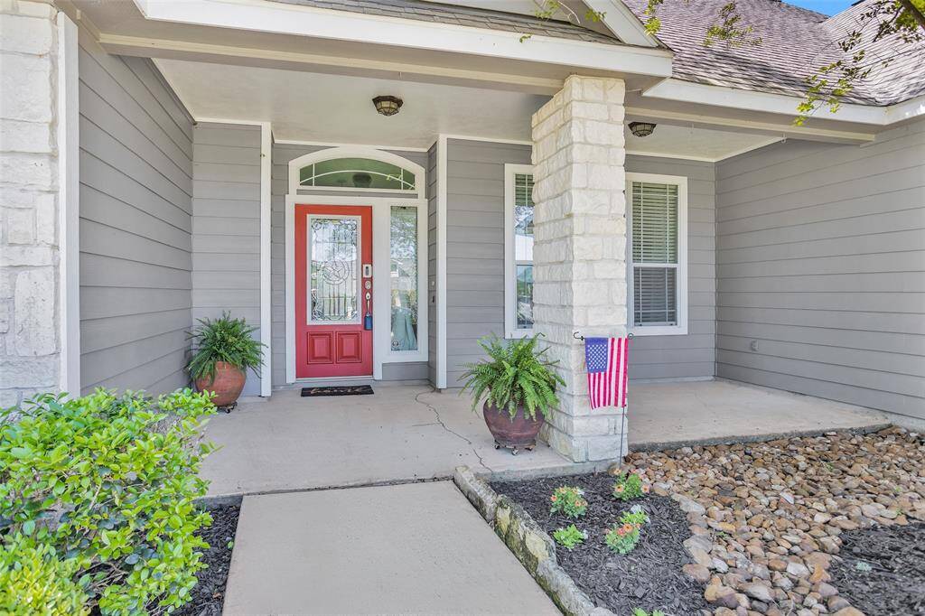 This porch and quaint red door are inviting you to sit and stay a while at 291 Berkley Drive in the amazing neighborhood of Buffalo Spring! Low HOA fee! and NO MUD TAX!