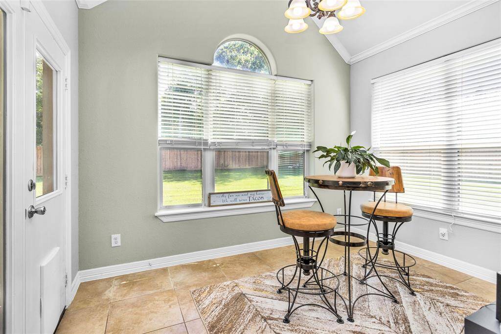The breakfast area is perfect for morning coffee with a view to the backyard.