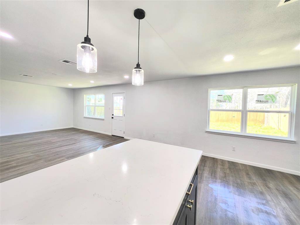 Light and bright kitchen with new cabinetry.