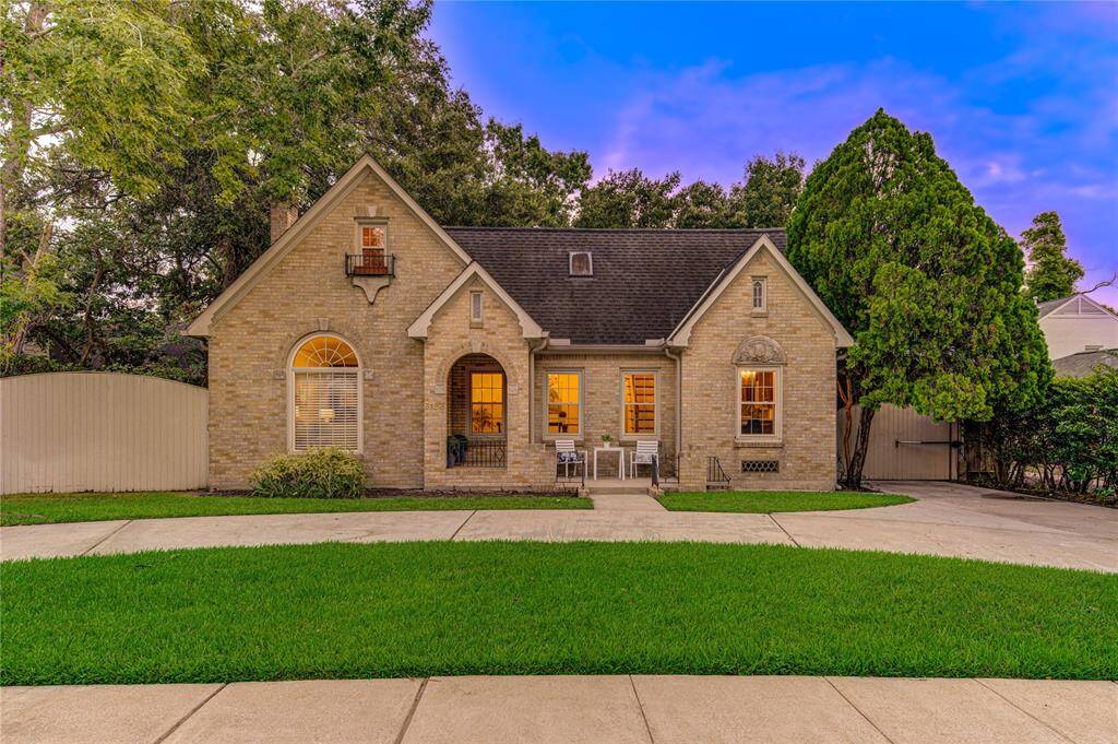 Stunning curb appeal with a beautifully landscaped front yard, mature trees, and a welcoming porch. This classic home's architecture exudes timeless elegance and charm, making a great first impression.