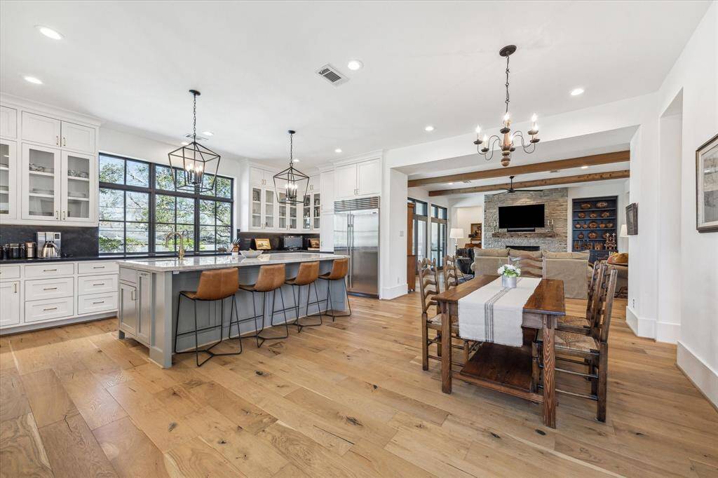 Open and airy with 10 foot ceilings and wonderfully proportioned rooms.  This is a fabulous home for hosting parties.