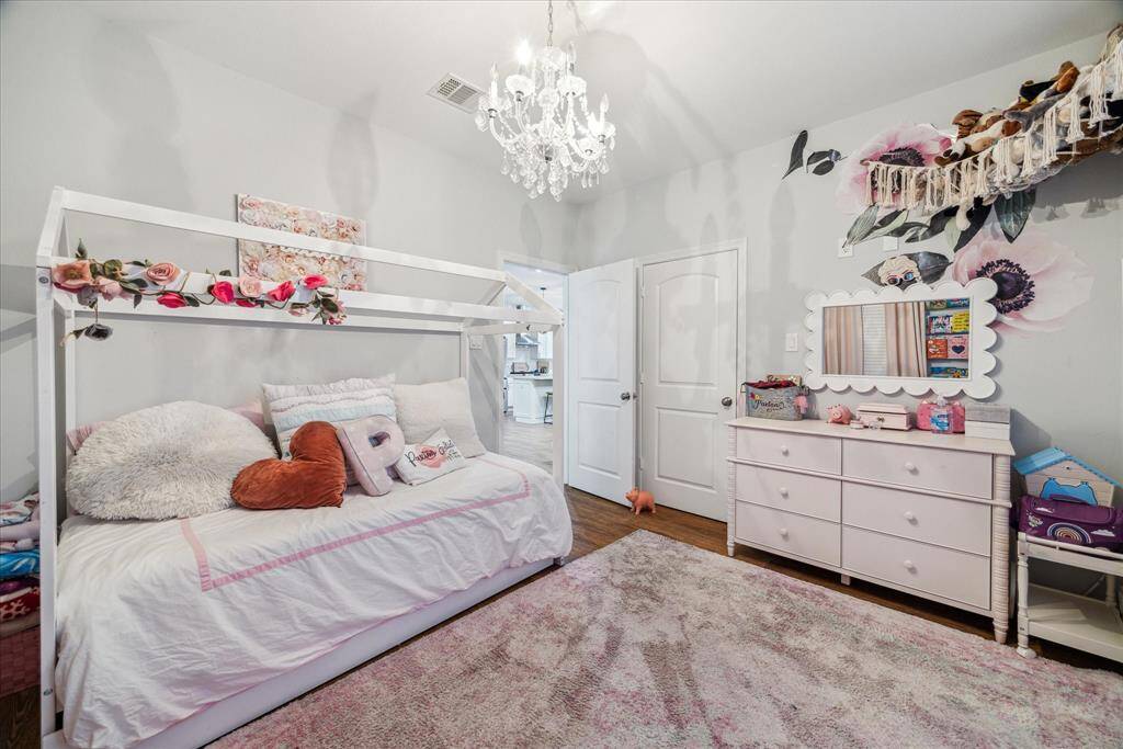 Another view of this adorable secondary bedroom