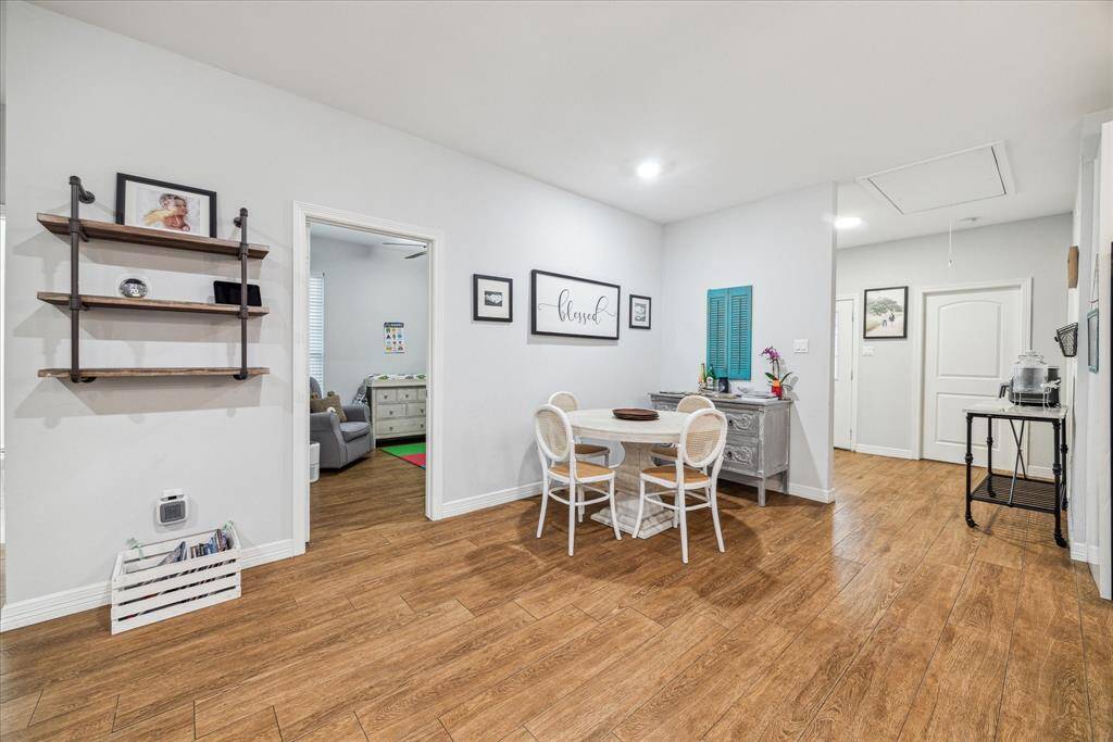 Large dining area conveniently located adjacent to the kitchen - large enough to fit a sizeable dining table